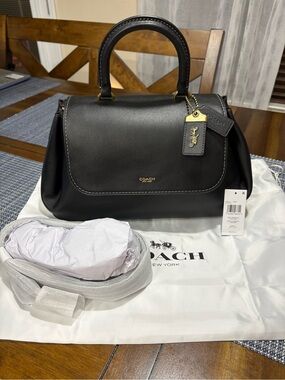Coach slouchy rogue top handle with brass hardware